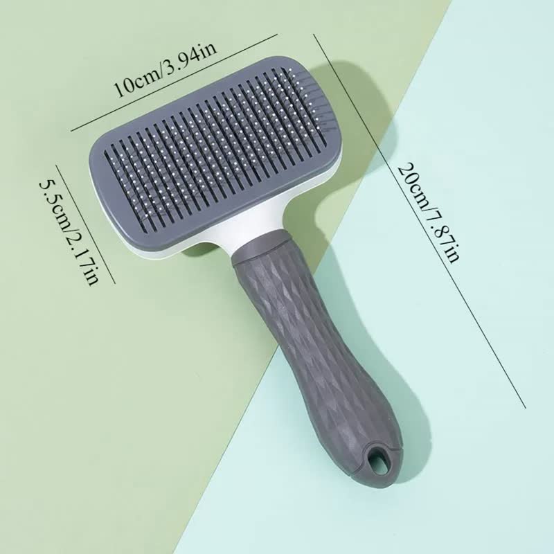 Self-cleaning slicker brush